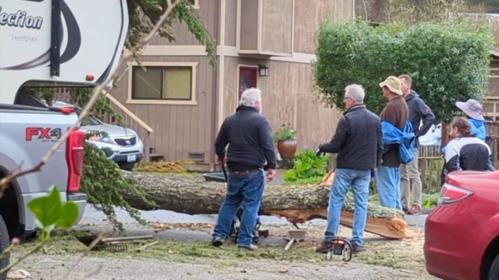 Bay Area storm Neighbors jump in to help San Mateo County man trapped