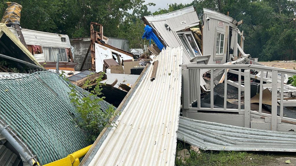 Houston storm damage Midtown drivers still traveling under leaning