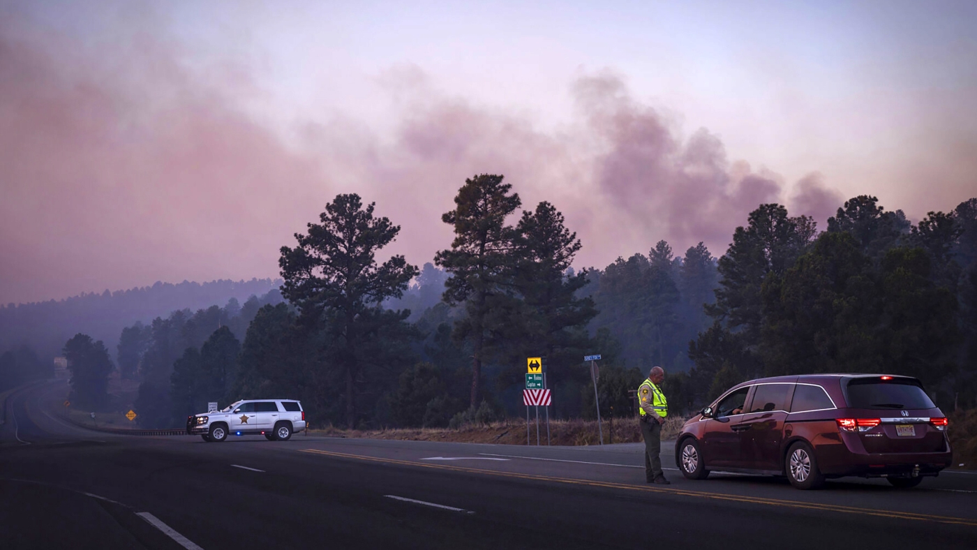 New Mexico wildfire has forced thousands to flee, governor says NPR