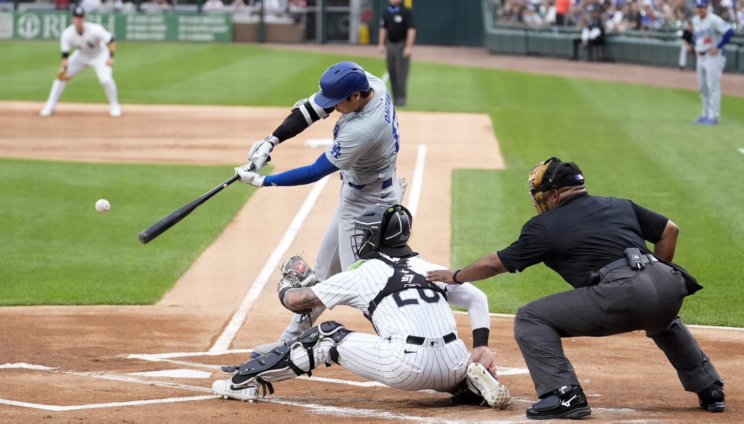 Shohei Ohtani gets jump on White Sox in Dodgers win, ties club RBI ...