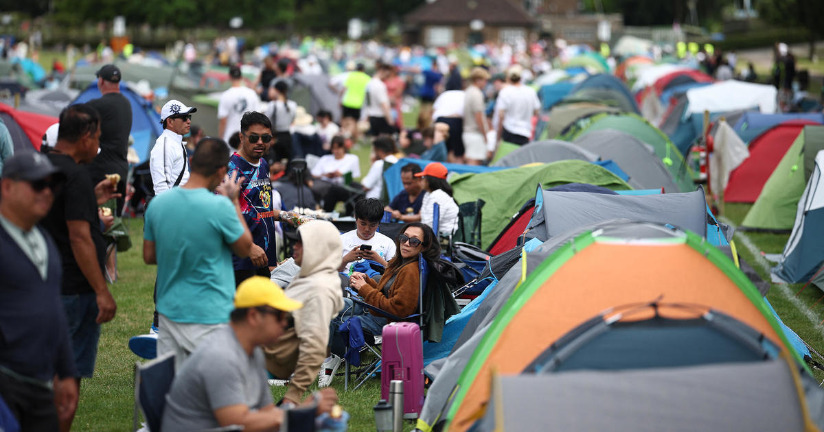 Meet the diehard tennis fans camped out in Wimbledon's epic "queue